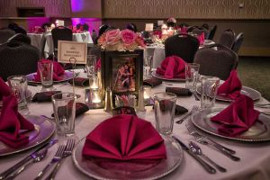 Red and Silver room setup with Silver Plate Chargers for a Wedding at the Red Oak Ballroom B in Fort Worth, Sundance Square