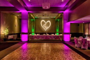 Dramatic Hot Pink and Green lighting with Custom Gobo for a Wedding at the Red Oak Ballroom B in Fort Worth, Sundance Square