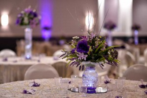 Beautiful Purple Centerpieces and full White linens at the Red Oak Ballroom B in San Antonio