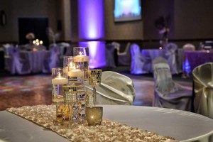 Dazzling Glass Candleholders and Textured Table Runner Decor at the Red Oak Ballroom B in Fort Worth, Sundance Square