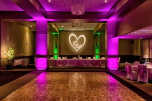 Dramatic Hot Pink and Green lighting with Custom Gobo for a Wedding at the Red Oak Ballroom B in Fort Worth, Sundance Square
