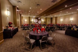 Elegant black and red Holiday Party set with Snowflake Gobo Light at Red Oak Ballroom Austin