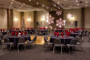 Elegant black and red Holiday Party set with Snowflake Gobo Light at Red Oak Ballroom Austin