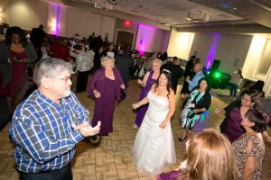Bride dancing with guests at the Red Oak Ballroom B in San Antonio