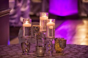 Special Glass Candle Decor with textured table linens for a Wedding Reception at the Red Oak Ballroom B in Fort Worth, Sundance Square