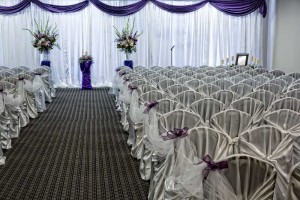 Elegant All White with Purple Accents Wedding Ceremony Room at the Red Oak Ballroom in Austin