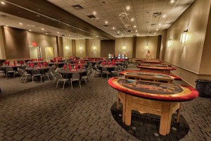 Festive black and red Holiday Party set with Casino tables at Red Oak Ballroom Austin