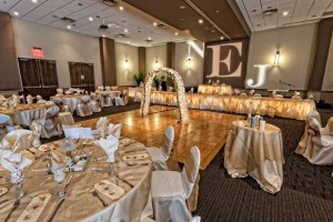 Gorgeous Gold and White Room set with Lighted Archway, Raised Head Table and Custom Gobo for a Wedding at the Red Oak Ballroom in Austin