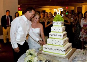 Bride and Groom Cutting the Cake at the Red Oak Ballroom in Houston, CityCentre