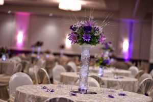 Beautiful Purple Centerpieces and full White linens at the Red Oak Ballroom B in San Antonio