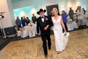 Wedding Couple arriving at the Red Oak Ballroom A in San Antonio