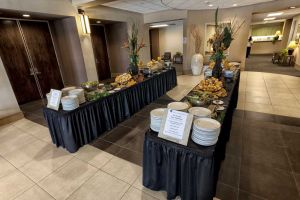 Festive Double Food Buffet setup in Austin Lobby for a Red Oak Ballroom Holiday Party